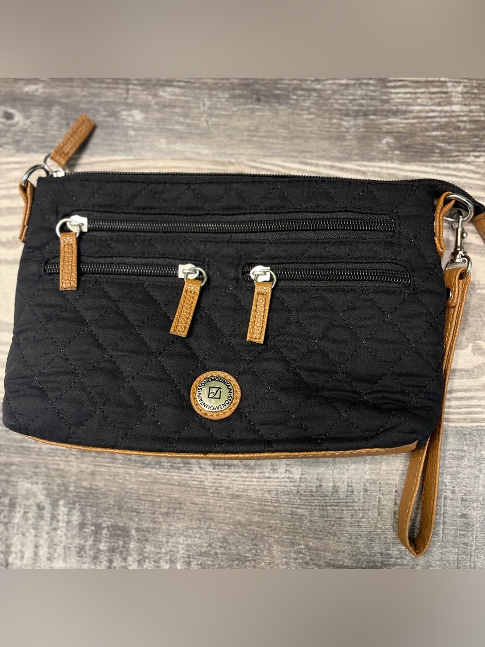 Stone Mountain Accessories Quilted Wristlet in Black with Brown Trim